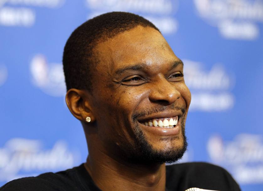 I giocatori di Miami si divertono anche in conferenza stampa. Qui  Chris Bosh a mostrare il suo sorriso. Reuters
